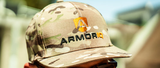 ArmorIQ cap in multicam with the embroidered ArmorIQ logo