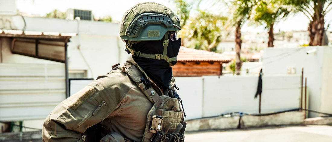 Operator wearing a plate carrier and helmet