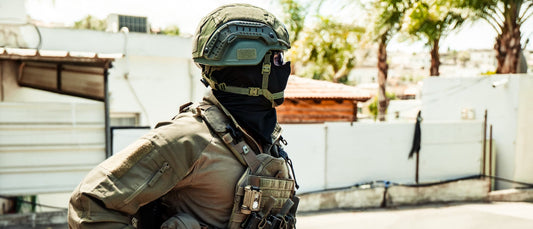 Operator wearing a plate carrier and helmet